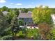 Aerial view of a private backyard oasis with lush landscaping and outdoor seating area, great for relaxation at 17395 E Dewberry Dr, Parker, CO 80134