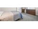 Comfortable bedroom featuring a dresser with drawers, providing ample storage space at 17395 E Dewberry Dr, Parker, CO 80134