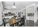 Updated kitchen featuring white cabinets, granite counters and stainless steel appliances at 17395 E Dewberry Dr, Parker, CO 80134