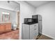 Convenient kitchenette space featuring appliances and storage, adding functionality to the room at 17395 E Dewberry Dr, Parker, CO 80134