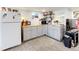 Basement kitchenette features functional appliances and ample storage space at 2221 Illinois St, Golden, CO 80401