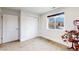 Minimalist bedroom with natural light and a view, ideal for rest and relaxation at 2221 Illinois St, Golden, CO 80401