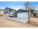 Exterior view of the garage with RV parking and adjacent to the main house at 2221 Illinois St, Golden, CO 80401