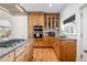Spacious kitchen with stainless steel appliances, custom cabinetry, and granite counters at 2221 Illinois St, Golden, CO 80401