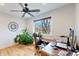 Bright home office with hardwood floors, natural light, and built in desk at 2221 Illinois St, Golden, CO 80401
