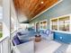 Cozy front porch seating area with stylish outdoor furniture and a relaxing ambiance at 2221 Illinois St, Golden, CO 80401