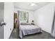 Bedroom featuring neutral colors, ceiling fan, and a relaxing atmosphere at 6678 S Arapahoe Dr, Littleton, CO 80120