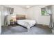 Relaxing bedroom with neutral colors and natural light at 6678 S Arapahoe Dr, Littleton, CO 80120