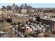 Urban neighborhood with modern townhomes and city skyline at 2922 W 26Th Ave # 1, Denver, CO 80211