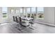 Dining area with large windows providing ample natural light and a view of the surrounding landscape at 8299 S Kellerman, Aurora, CO 80016