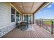 Inviting covered patio with outdoor seating, string lights, and scenic views for relaxing and entertaining at 8299 S Kellerman, Aurora, CO 80016