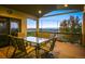 Outdoor deck with a seating arrangement and views of the surrounding area at 1743 Homestead Dr, Fort Lupton, CO 80621