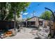 Backyard includes a dining set, a BBQ grill, an egg chair and modern design at 3618 Navajo St, Denver, CO 80211