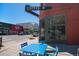 Coffee shop corner with outdoor seating and clear signage on a sunny day at 3618 Navajo St, Denver, CO 80211