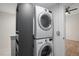 Conveniently stacked washer and dryer setup in the laundry area at 3618 Navajo St, Denver, CO 80211