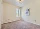 Cozy bedroom with carpet flooring, shuttered windows, and neutral decor, creating a comfortable atmosphere at 10045 Copenhagen St, Parker, CO 80134