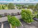 Aerial view of the homes, community, and surrounding landscape at 6513 Pinewood Dr, Parker, CO 80134