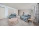 Living room features comfortable furniture, neutral tones, plush carpeting, and lots of natural light at 6513 Pinewood Dr, Parker, CO 80134