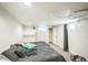 Bedroom featuring multiple beds and an adjacent closet at 3241 Sheridan Blvd, Wheat Ridge, CO 80212