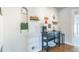 Stylish dining area with coffee bar features a coffee maker and decor at 3241 Sheridan Blvd, Wheat Ridge, CO 80212