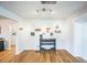 Bright dining area with a black table and modern decor at 3241 Sheridan Blvd, Wheat Ridge, CO 80212