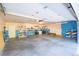 Spacious garage interior featuring ample storage shelving and a large open floor space at 3241 Sheridan Blvd, Wheat Ridge, CO 80212