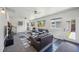 Bright living room with stylish decor, two couches, and plenty of natural light at 3241 Sheridan Blvd, Wheat Ridge, CO 80212