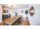 Spacious room featuring hardwood floors and decorative accents at 3241 Sheridan Blvd, Wheat Ridge, CO 80212