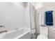 This bathroom features a shower-tub combo and is equipped with convenient towel racks at 1920 Pioneer Cir, Lafayette, CO 80026