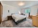 Bright bedroom with carpet, a window, and minimal furniture at 14665 E Stanford Pl, Aurora, CO 80015
