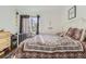 Bedroom with double bed, dresser, and wood floors at 1164 Chester St, Aurora, CO 80010