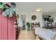 Bright and airy entryway with view into living room and bathroom at 1164 Chester St, Aurora, CO 80010