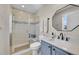 Modern bathroom with a walk-in shower and updated vanity at 14653 E Crestridge Dr, Centennial, CO 80015