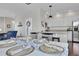 Charming dining area with table and chairs, adjacent to kitchen at 14653 E Crestridge Dr, Centennial, CO 80015