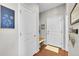 Inviting entryway with built-in bench and coat closet at 14653 E Crestridge Dr, Centennial, CO 80015