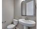 Powder room featuring a pedestal sink at 16744 W 93Rd Pl, Arvada, CO 80007