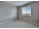 Bedroom with neutral carpet, one window, and outlets at 16744 W 93Rd Pl, Arvada, CO 80007