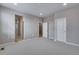 Large bedroom with carpet, neutral paint, and closet at 16744 W 93Rd Pl, Arvada, CO 80007