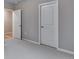 Hallway with carpeting and white doors at 16744 W 93Rd Pl, Arvada, CO 80007