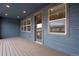 Spacious covered patio with door at 16744 W 93Rd Pl, Arvada, CO 80007