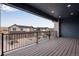 Balcony view overlooking townhomes and parking at 16744 W 93Rd Pl, Arvada, CO 80007