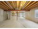 Large basement with exposed beams and a utility closet at 13959 E 106Th Ave, Commerce City, CO 80022