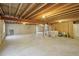 Unfinished basement with exposed beams and plenty of potential at 13959 E 106Th Ave, Commerce City, CO 80022