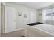 Bedroom featuring white walls, closet and natural light from a window at 13959 E 106Th Ave, Commerce City, CO 80022