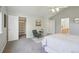 Relaxing bedroom features neutral colors, carpeted floors, a walk-in closet and ensuite bathroom access at 13959 E 106Th Ave, Commerce City, CO 80022