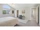 Bright main bedroom with closet, seating area and decor at 13959 E 106Th Ave, Commerce City, CO 80022