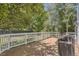 Spacious wooden deck with grill, perfect for outdoor entertaining and relaxation at 9545 Grand Cypress Cv, Lone Tree, CO 80124