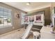 Fun bedroom with a creative house bed frame, slide, and bright natural light at 9545 Grand Cypress Cv, Lone Tree, CO 80124