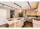 Stylish kitchen with an island, stainless steel appliances, and ample cabinet space at 9545 Grand Cypress Cv, Lone Tree, CO 80124