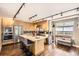 Modern kitchen featuring stainless steel appliances, granite countertops, and a breakfast bar at 9545 Grand Cypress Cv, Lone Tree, CO 80124